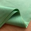 Těžší zelené pevné bavlněné plátno barva hrášková