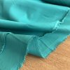 Saténová viskózová Podšívkovina tyrkysová lehce pružná