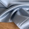 Saténová viskózová podšívkovina v keprové vazbě bledě modrá lesklá