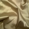 Satén v lehkém bronzu, lehce pružný, imitace hedvábí