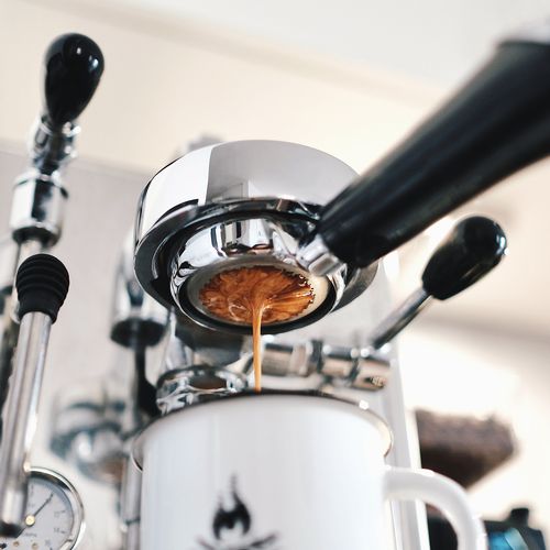 Brewing espresso Brewing espresso