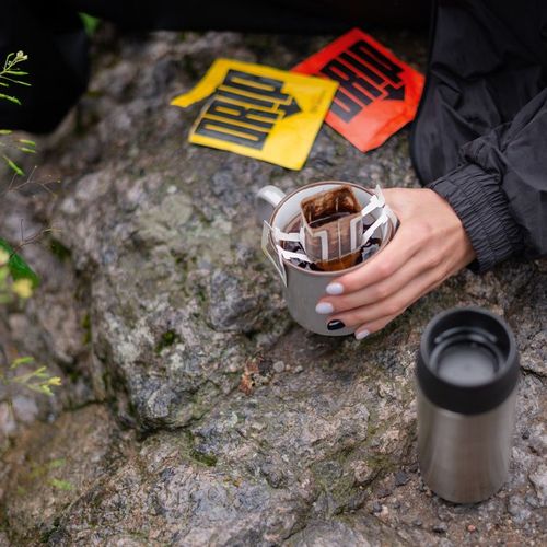 Brewed coffee drip in a cup Brewed coffee drip in a cup