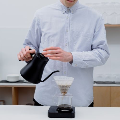 Man brewing coffee