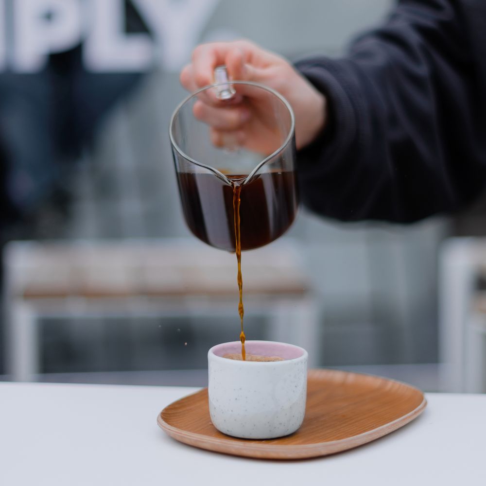 Pouring black coffee