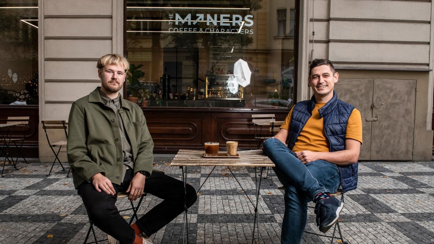 The founders outside the first The Miners coffee shop in Prague
