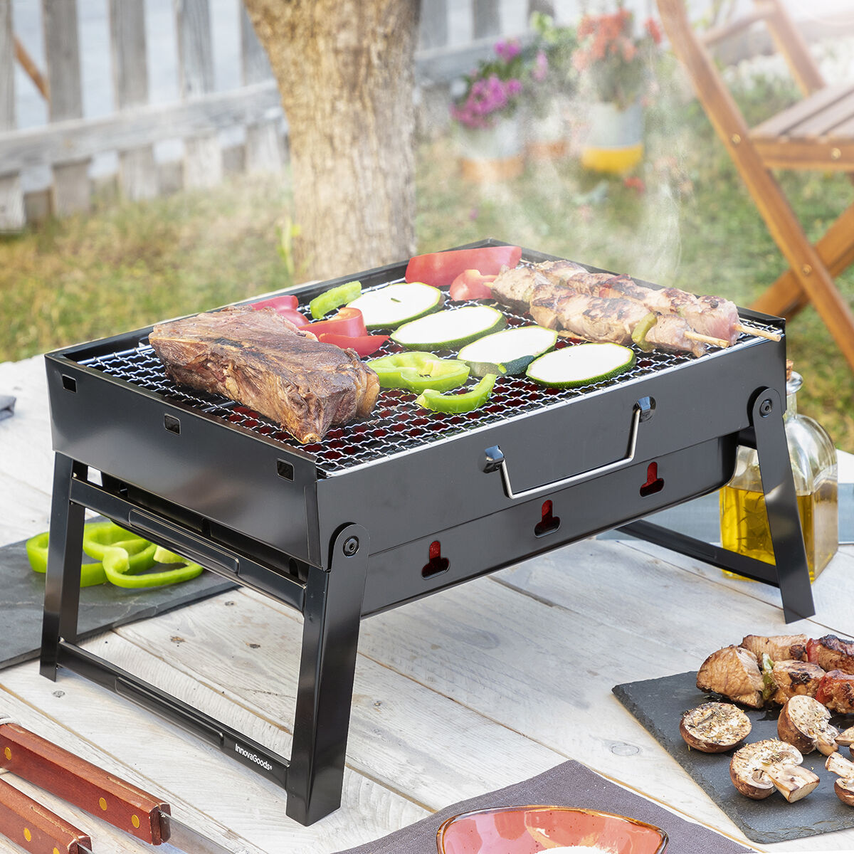 InnovaGoods Prenosný skladací gril na drevené uhlie BearBQ