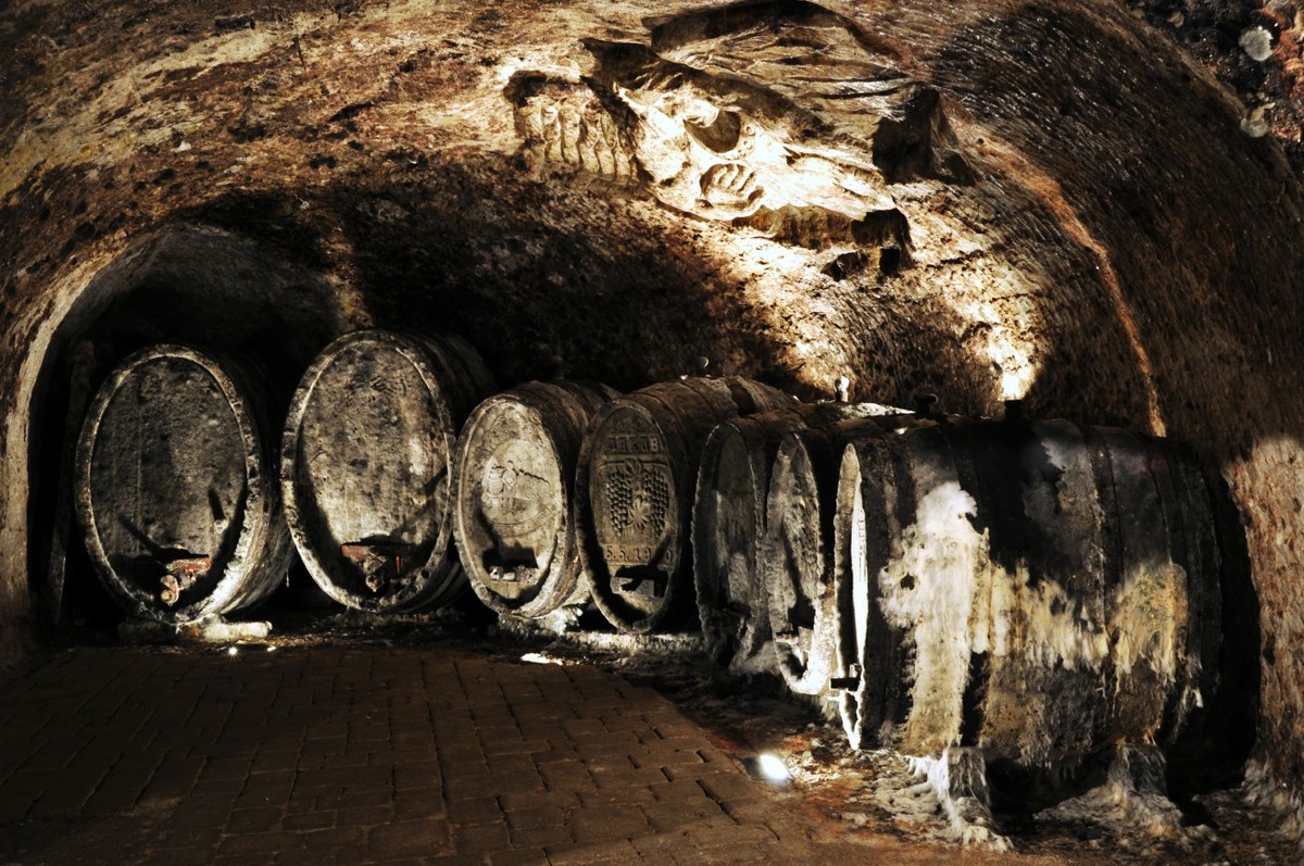 Oak barrels in the tuff cellar at J & J Ostrožovič