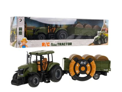 Zelený traktor s prívesom na diaľkové ovládanie