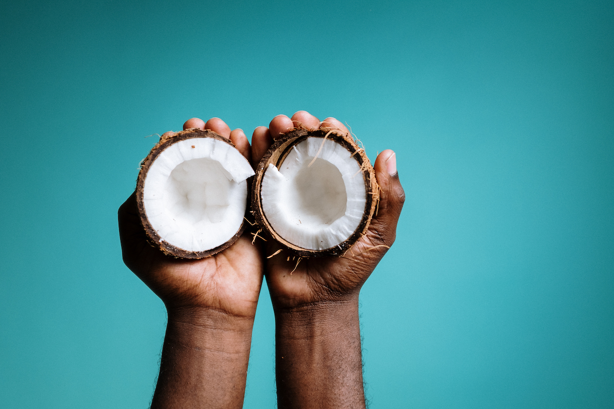 photo-of-person-holding-coconut-4631069