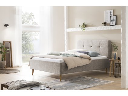 Manželská postel s čalouněným čelem140x200