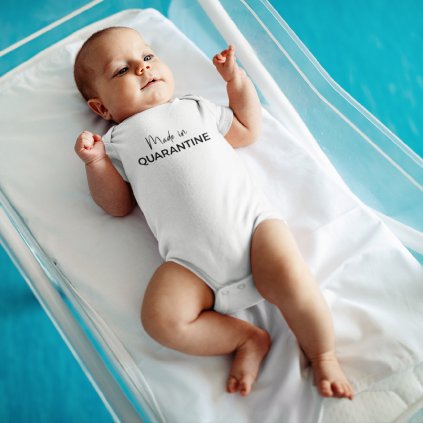 onesie mockup featuring a baby boy on a small crib 45748 r el2
