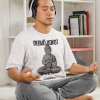 t shirt mockup of man with headphones doing yoga in his room m25362 r el2