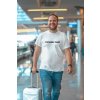 ai created tee mockup of a happy man walking through an airport with his suitcase m40557
