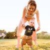 onesie mockup featuring a baby taking his first steps with his mom 36003 r el2