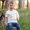 t shirt mockup of a toddler sitting on a log 2911 el1
