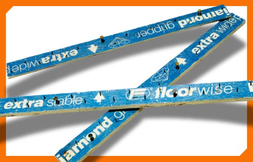 Tufting frames and carpet grippers