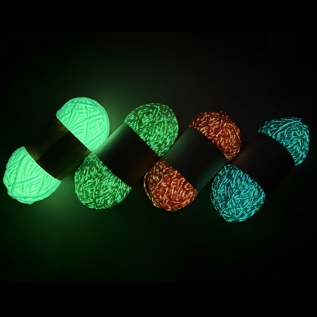 Glow in the dark yarn by day and at night – white, blue and neon green