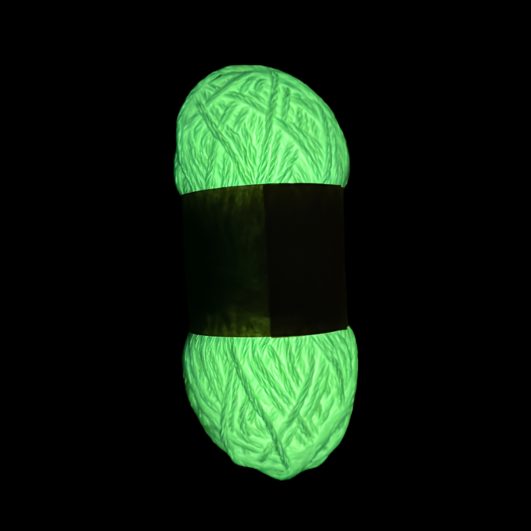 White glow in the dark yarn glowing green