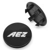 krytka průměr 60/76mm(vnitřní,vnější) AEZ, plast (ZA2010B, N44)černá lesklá, úchyt 7mm