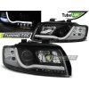 3268 cerny trubkovy svetlomet pro audi a4 10 00 10 04