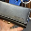 Černá kožená kasírka BELLUGIO Leather s monogramem (ražba)  + Akce - zlatá mince Pro štěstí ZDARMA