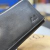 Černá kožená kasírka BELLUGIO Leather s monogramem (ražba)  + Akce - zlatá mince Pro štěstí ZDARMA