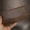 Tmavě hnědá kožená kasírka NAPPA Leather s monogramem (ražba)