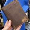 Pánská tmavě hnědá kožená peněženka HUNTER Leather s monogramem (ražba)  + Akce - zlatá mince Pro štěstí ZDARMA