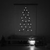 adventní strom se svítícími puntíky