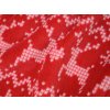 Teplý vánoční overal CHRISTMAS ONESIE červený s motivem sobů