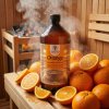 Generated with Kive.ai close up photo steam room essence 1L bottle Orange surrounded with lots of juicy oranges resized Photoroom
