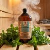 Generated with Kive.ai close up photo steam room essence 250ml bottle Nepalese mint surrounded with lots of mint leaves (1) resized 1 Photoroom