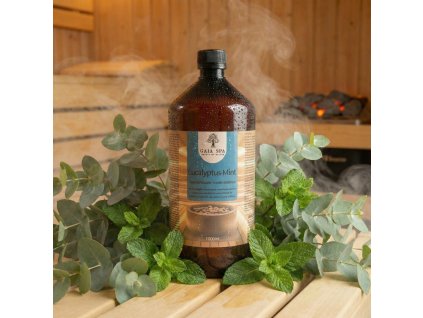 Generated with Kive.ai close up photo steam room essence 1L bottle Eucalyptus Mint surrounded with lots of eucalyptus and mint leaves resized Photoroom