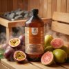 Generated with Kive.ai close up photo steam room essence 1L bottle Passionfruit & Guava surrounded with lots of juicy passionfruits and guavas resized Photoroom
