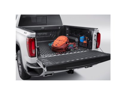 GMC Sierra 1500 5.gen Podložka do postele s integrovanými úložnými kapsami s logem GMC (pro standardní modely postelí)