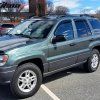 Jeep Grand Cherokee 1999-2004 Deflectores de ventanilla estilo Slim acrílico ahumado