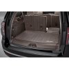 Chevrolet Suburban 12th gen Integrated trunk liner in very dark Atmosphere color with Chevrolet lettering