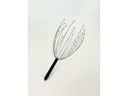 Uvoľňujúci masážny prístroj na pokožku hlavy