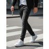 ČERNÉ PÁNSKÉ DŽÍNY S APLIKACEMI (Velikost 29)