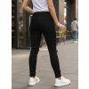 DÁMSKÉ JOGGER JEANS S DÍRAMI ČERNÉ (Velikost S)