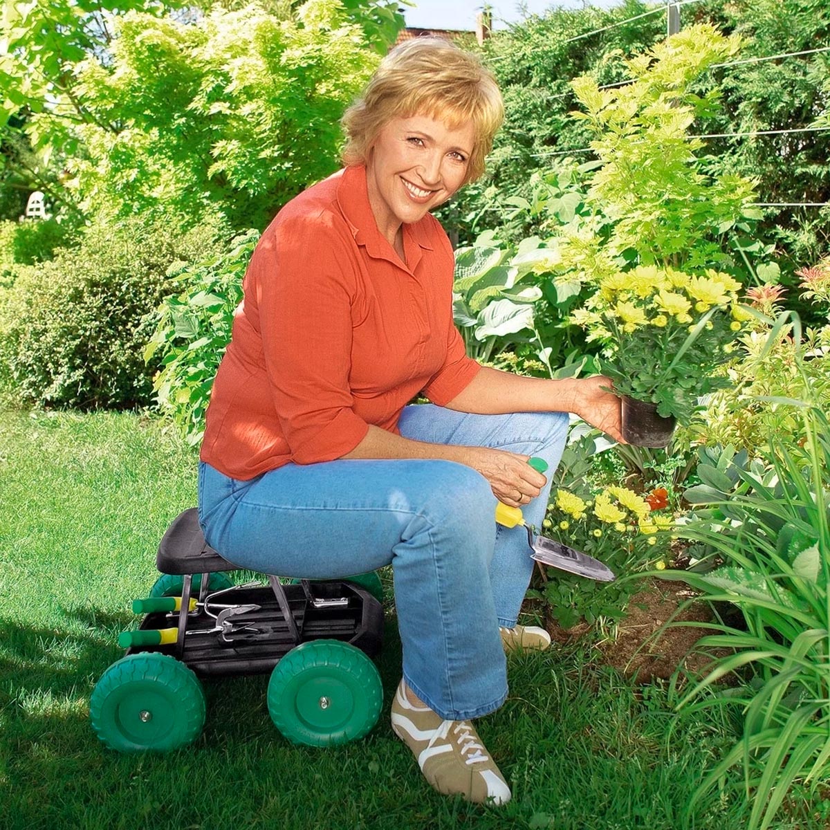 Die moderne Hausfrau Pojízdné sedátko