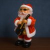 Santa Claus so spievajúcou gitarou – tancuje, spieva a hýbe okuliarmi (27 cm)