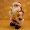 Vianočné dekorácie – Santa Claus spievajúci a držiac vrece s darčekmi
