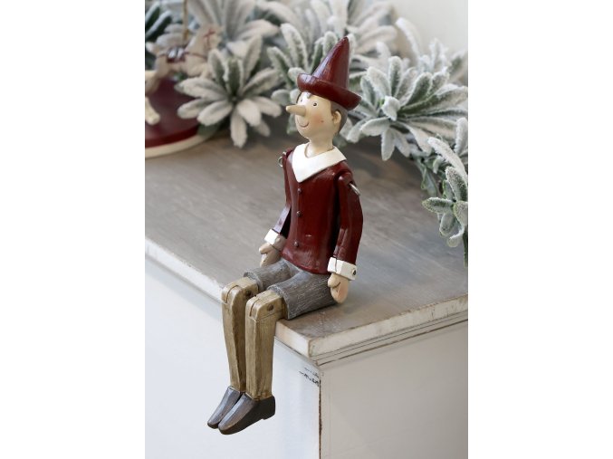 Dekorace sedící Pinocchio - 20*6,5*10 cm