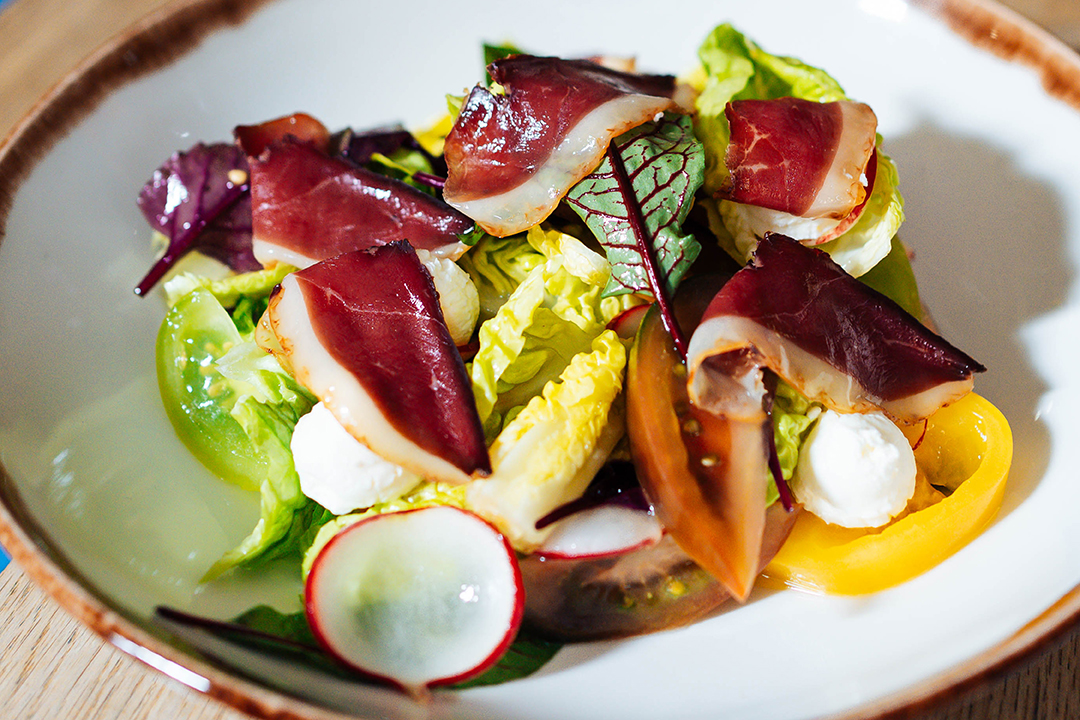We also have salads on offer, these are crisp salad leaves with duck prosciutto from our butcher Chovaneček.