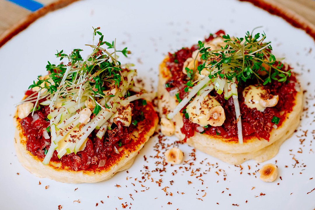 Potato pancakes and deer tartare, this is what a classic dish of our Czech cuisine looks like.