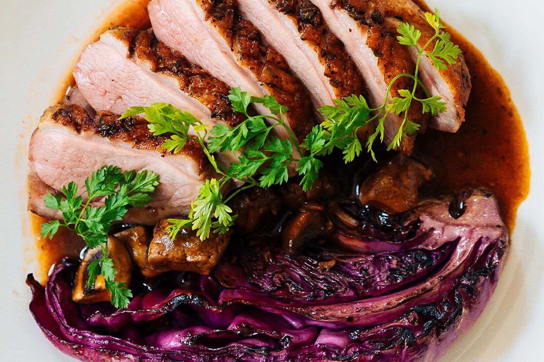 You'll find duck in many of our dishes. Here we have duck breast, grilled red cabbage and a ragout of calf's liver and mushrooms.