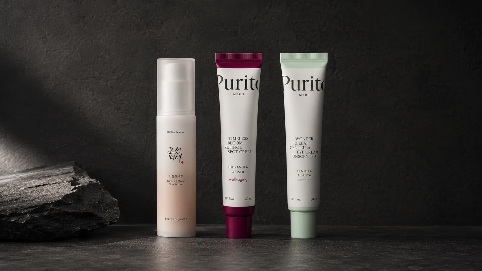 Flatlay produktů pro muže 40+ – SPF sérum, retinolový spot krém a oční krém