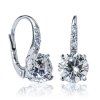 Sparkling dangling earrings with zircons in 14K white gold