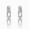 Subtle earrings with white sapphires in white gold, 14K